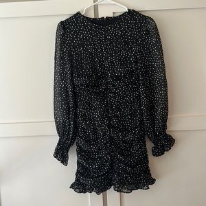 Black mini long sleeve dress with silver /white dots